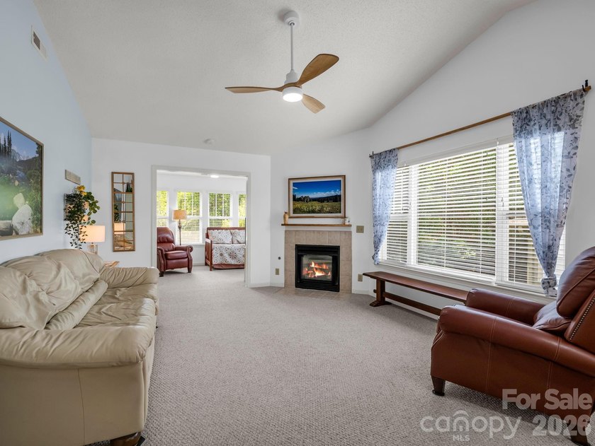 Experience sophisticated comfort in this pristine upper level - photo 12