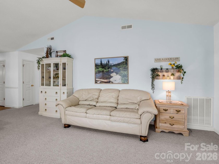 Experience sophisticated comfort in this pristine upper level - photo 14