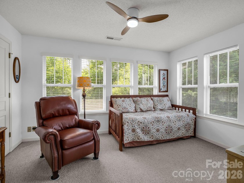 Experience sophisticated comfort in this pristine upper level - photo 15