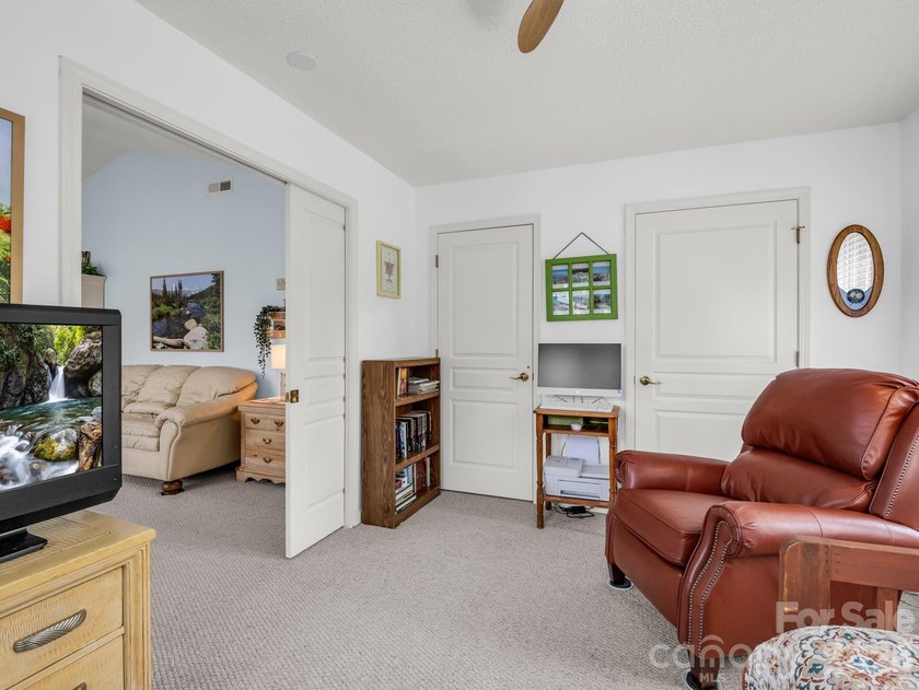Experience sophisticated comfort in this pristine upper level - photo 16