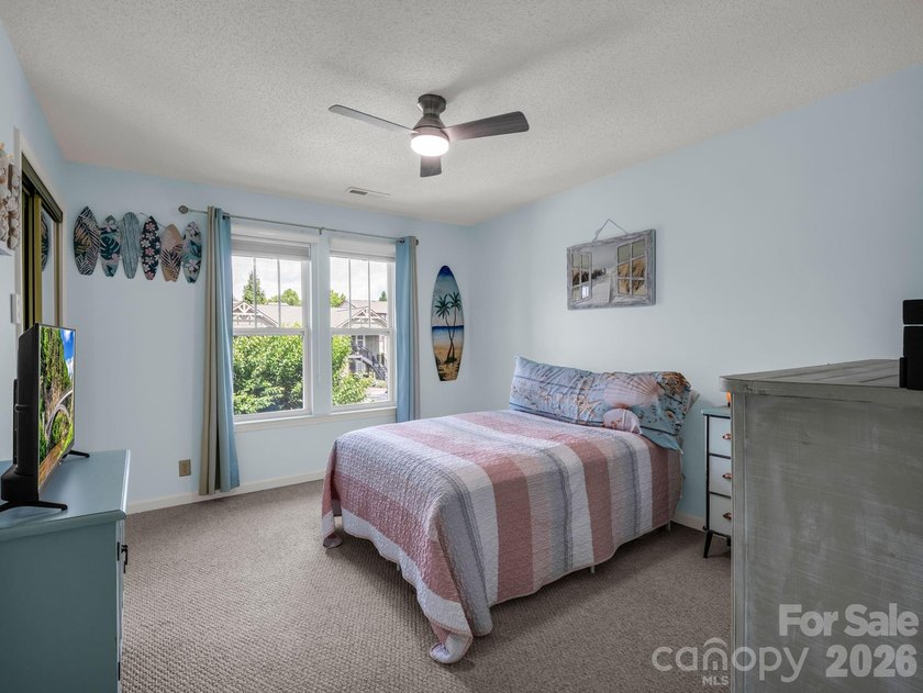 Experience sophisticated comfort in this pristine upper level - photo 17