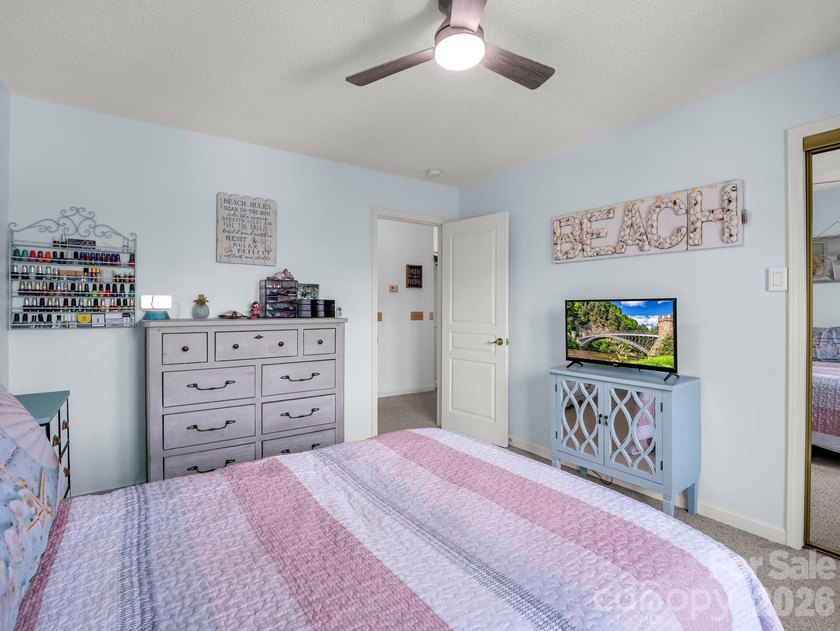 Experience sophisticated comfort in this pristine upper level - photo 18