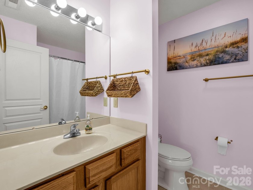 Experience sophisticated comfort in this pristine upper level - photo 19