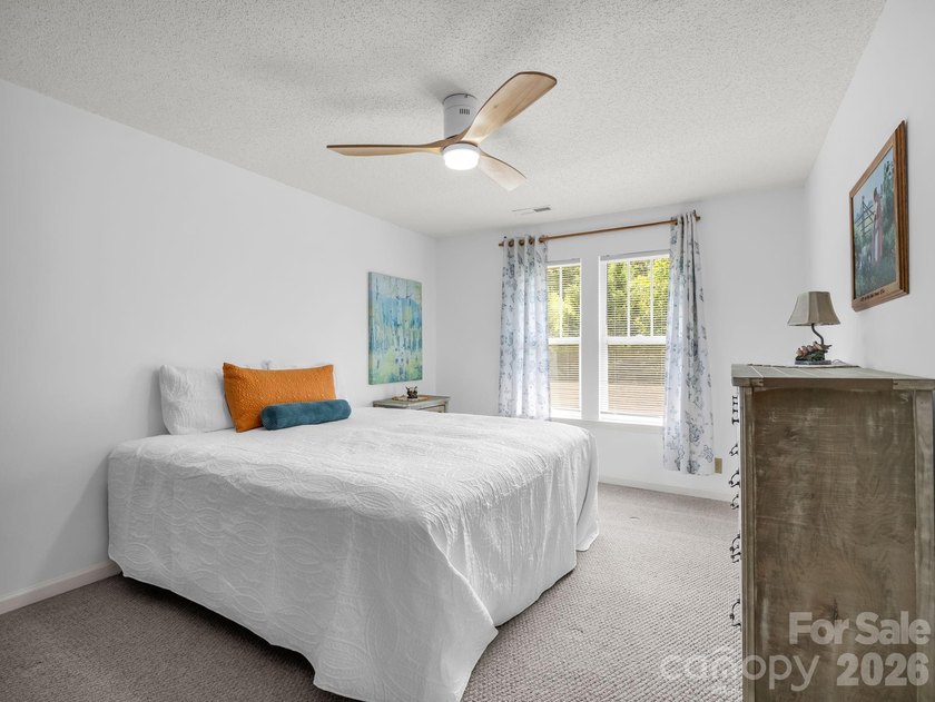 Experience sophisticated comfort in this pristine upper level - photo 24