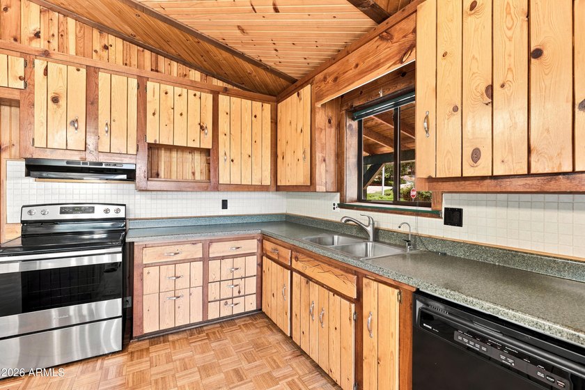 This corner-lot gem captures the perfect mountain-home look and - photo 16