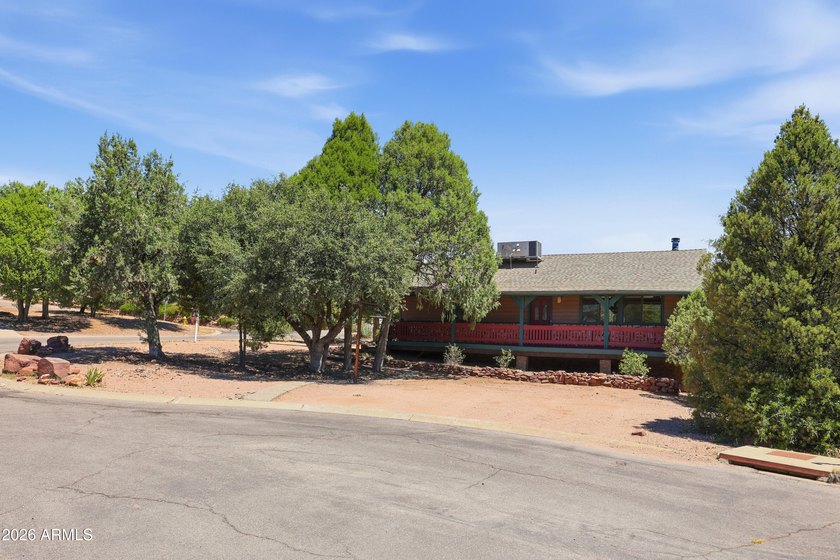 This corner-lot gem captures the perfect mountain-home look and - photo 30