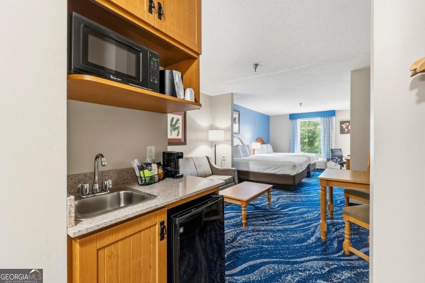 Welcome to effortless Lake Oconee living at The Lodge! Whether - photo 9