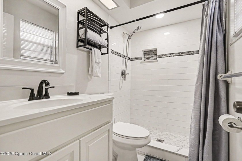 This exceptional 3-bed, 2-bath home in NW Palm Bay offers an - photo 11