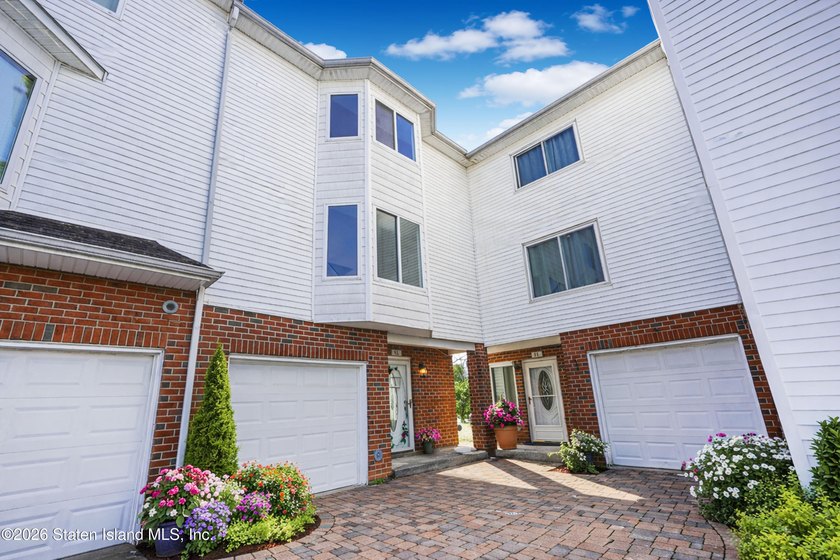 Built in 2004, fully renovated in 2026 this huge end unit - photo 2