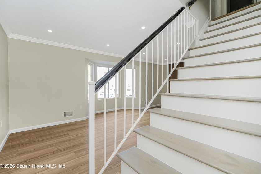 Built in 2004, fully renovated in 2026 this huge end unit - photo 9