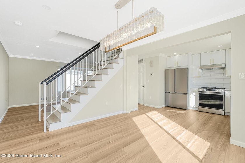 Built in 2004, fully renovated in 2026 this huge end unit - photo 10
