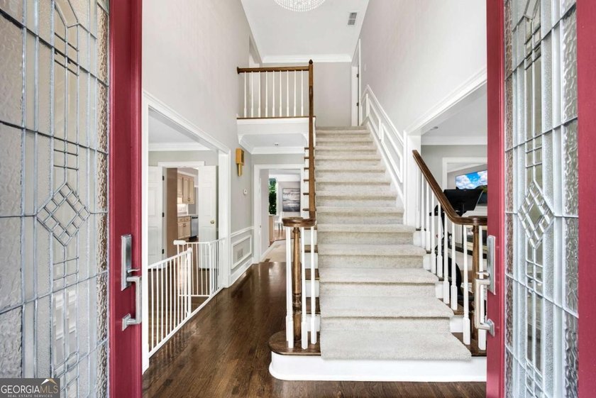 Nestled in the Highly Sought-After Active Swim/Tennis and Lake - photo 2