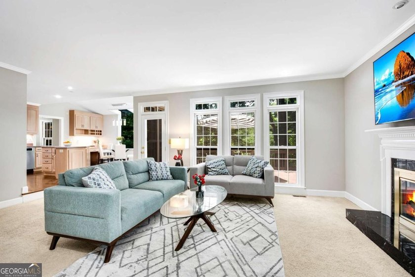 Nestled in the Highly Sought-After Active Swim/Tennis and Lake - photo 10
