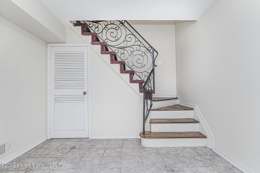 Welcome to 73 Gary Place! This large 2-family, semi-attached - photo 3