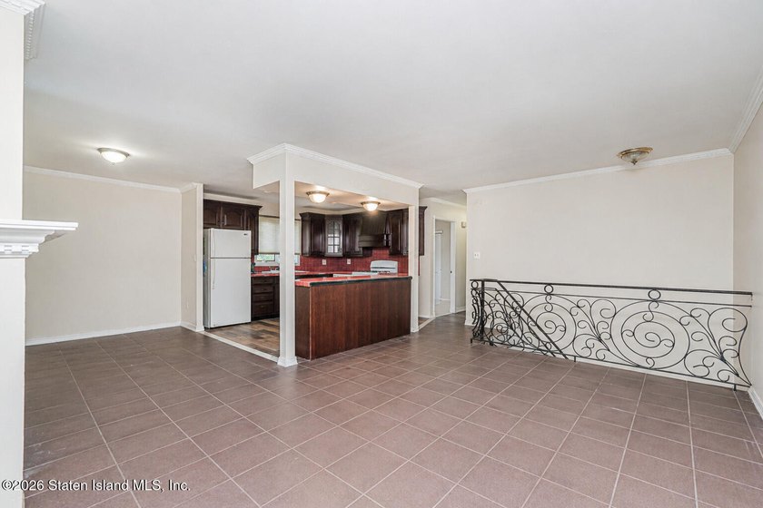 Welcome to 73 Gary Place! This large 2-family, semi-attached - photo 5