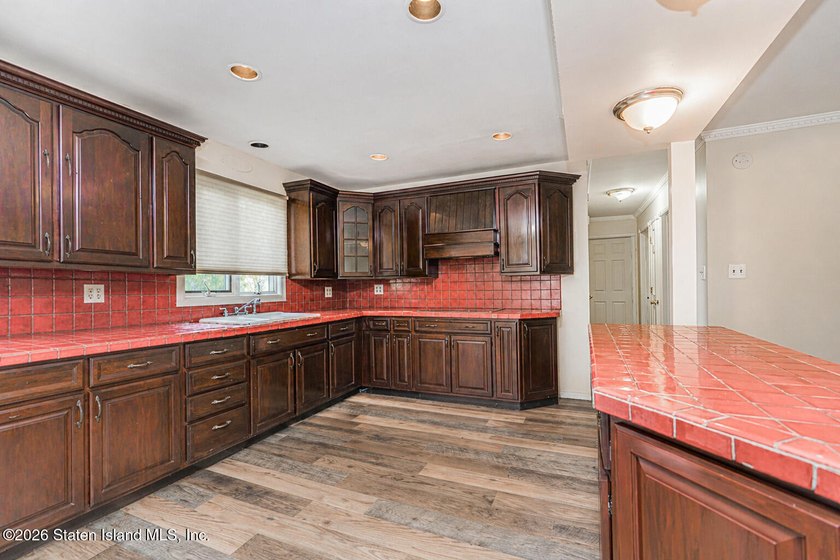 Welcome to 73 Gary Place! This large 2-family, semi-attached - photo 8