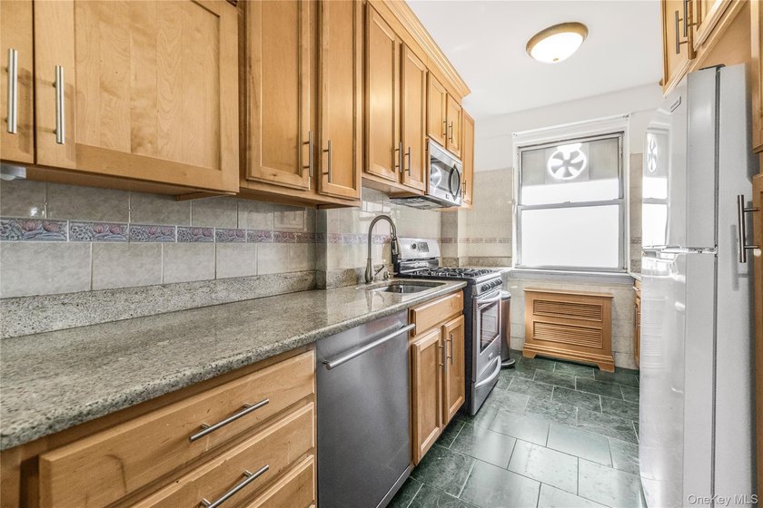 Discover this stunning renovated two-bedroom, two-full-bath coop - photo 2