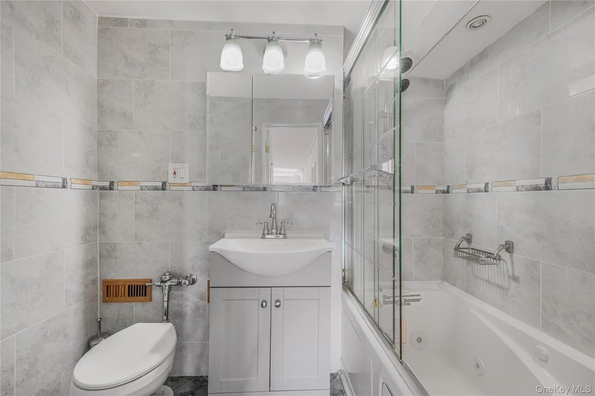 Discover this stunning renovated two-bedroom, two-full-bath coop - photo 8