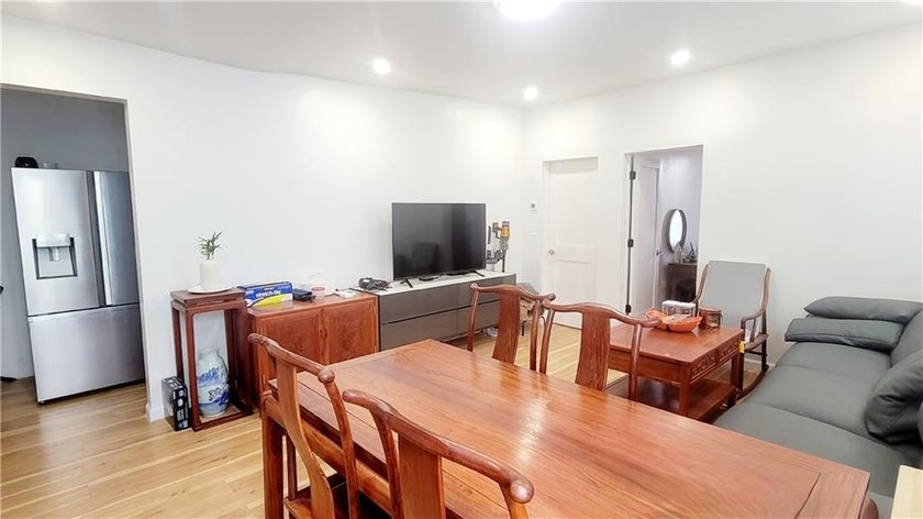Welcome to this Extra Large 4 family brick house situated in the - photo 3
