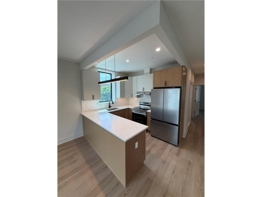 NEW CONSTRUCTION Welcome to The Panda Condominiums, the crown - photo 6