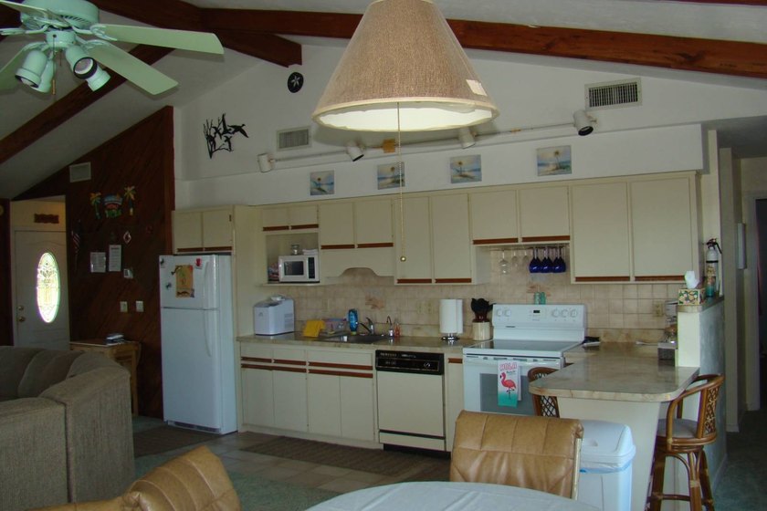 Step back to a simpler time in this charming coastal retreat - photo 6