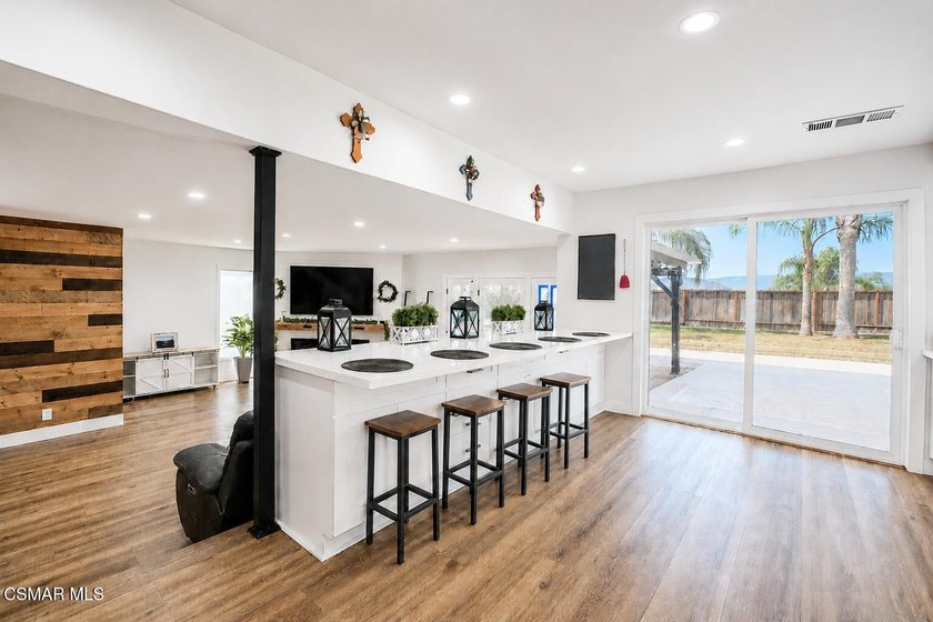 Welcome home to this beautifully updated smart home located in - photo 5