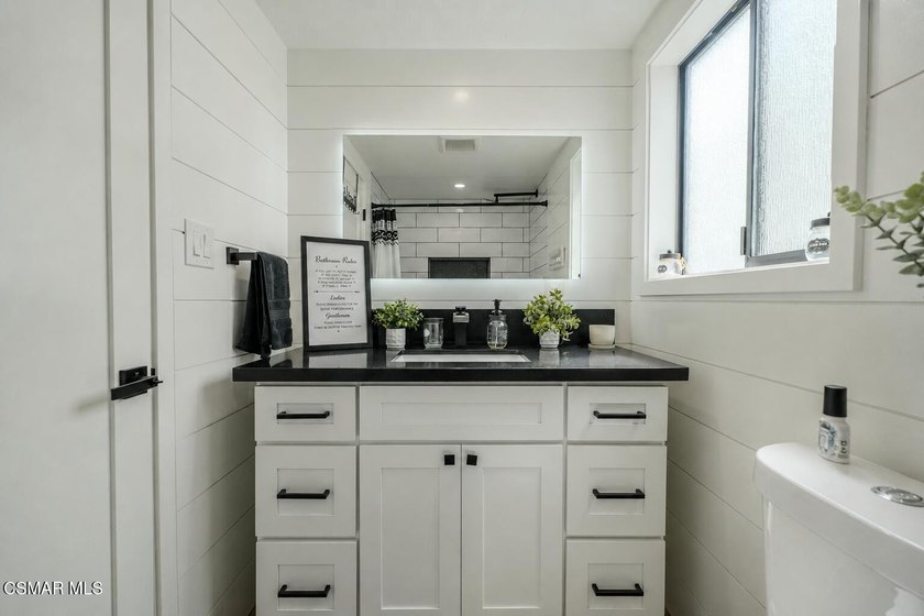 Welcome home to this beautifully updated smart home located in - photo 9