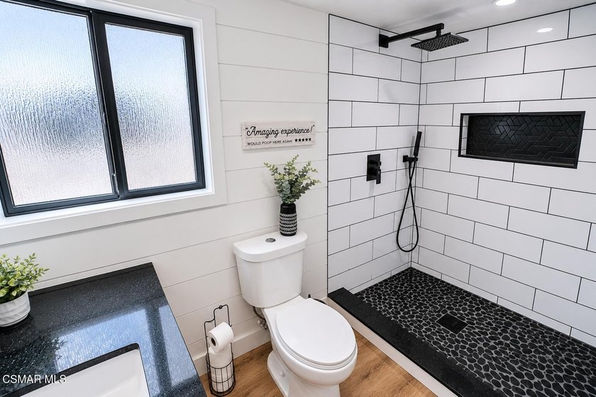 Welcome home to this beautifully updated smart home located in - photo 10