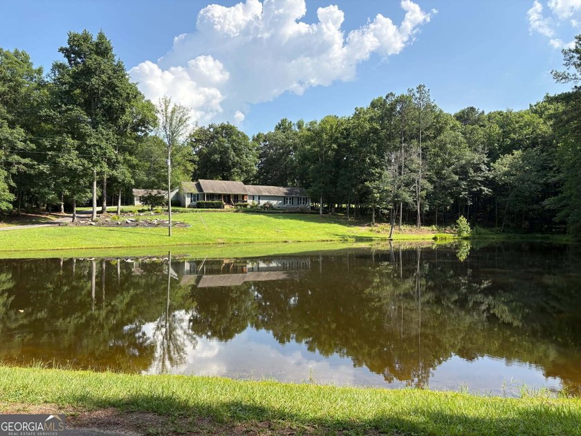 I am excited to feature this exceptional 4-bedroom, 3-bathroom - photo 2