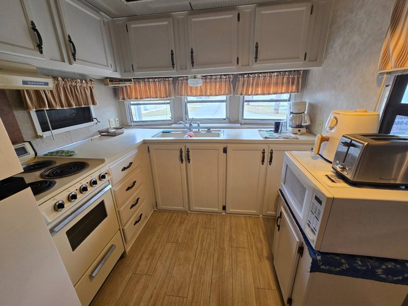 Welcome to this move-in-ready park model home nestled in - photo 2