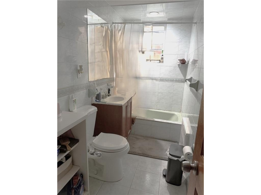 Located in a prime Gravesend location, this solid three-story - photo 7