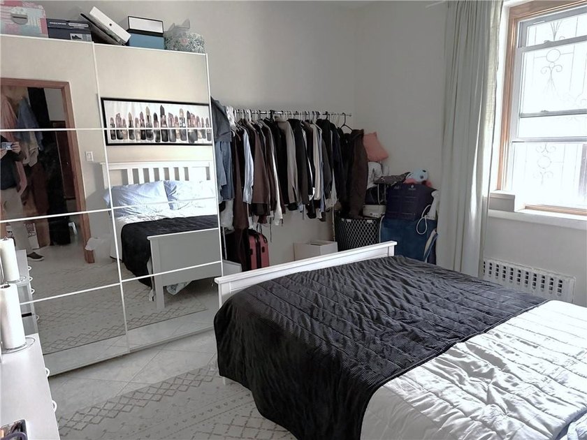 Located in a prime Gravesend location, this solid three-story - photo 8