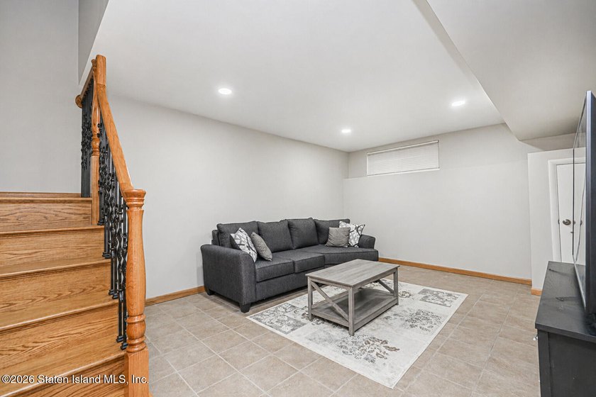 Welcome to 33 Linda Lane, a beautifully maintained multi-level - photo 9