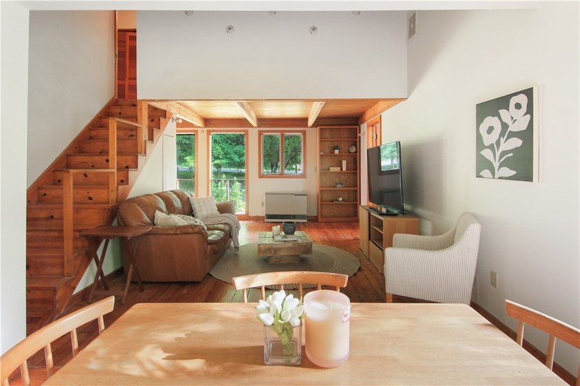Beautiful contemporary home tucked into the woods with a creek - photo 12