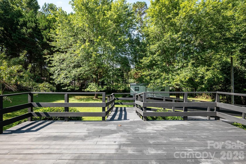 Charming one-level home nestled on a quiet street with numerous - photo 3
