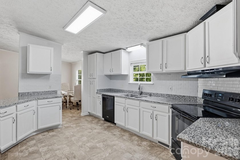 Charming one-level home nestled on a quiet street with numerous - photo 8