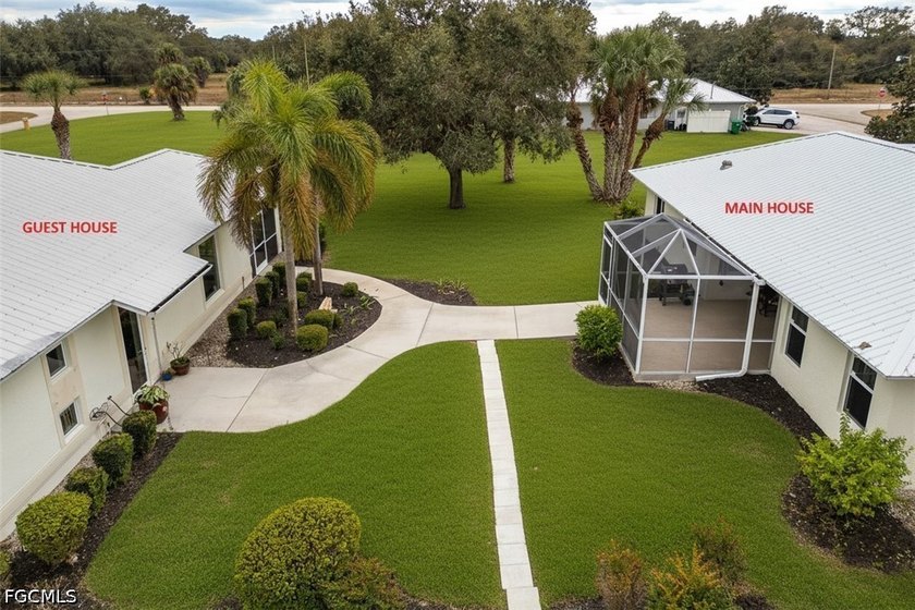 HOUSE + GUEST HOUSE + A STUDIO + A 5 CAR GARAGE, WITH 3 UNDER - photo 3