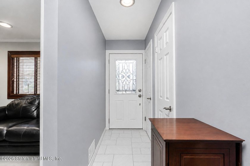 Welcome to 509 Eltingville Blvd, a charming single-family home - photo 3