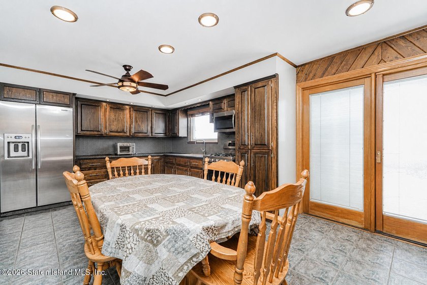 Welcome to 509 Eltingville Blvd, a charming single-family home - photo 6