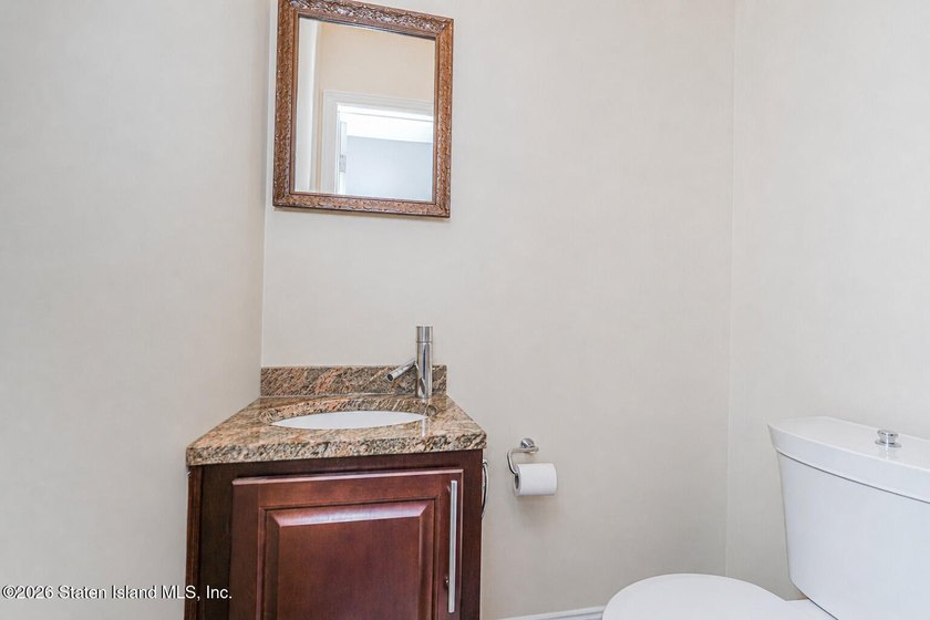 Welcome to 509 Eltingville Blvd, a charming single-family home - photo 8