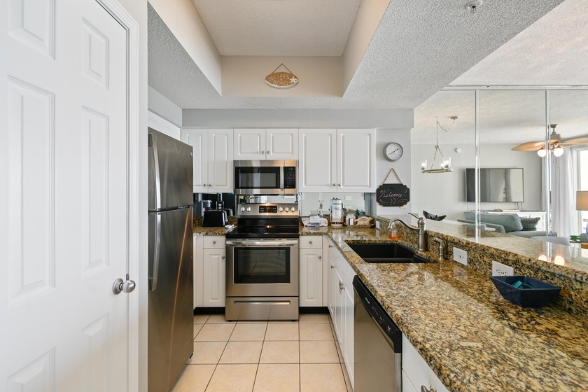 Gulf views take center stage in this beautifully updated - photo 8