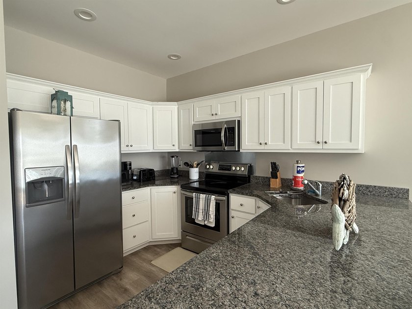 Turn-key coastal investment opportunity! These fully furnished - photo 6