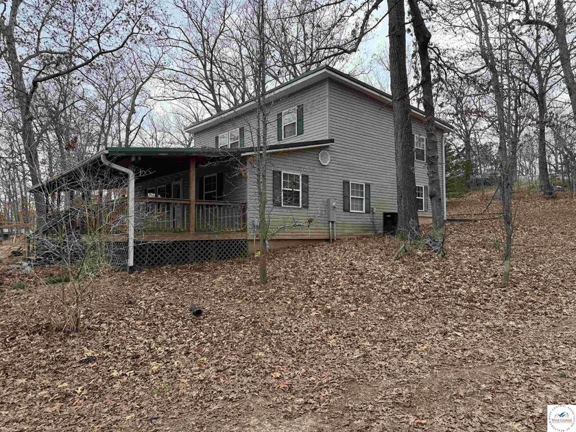 Enjoy the lake lifestyle in this spacious 4-bedroom, 2-bath home - photo 2