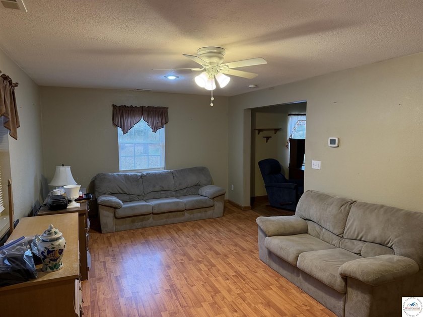 Enjoy the lake lifestyle in this spacious 4-bedroom, 2-bath home - photo 5