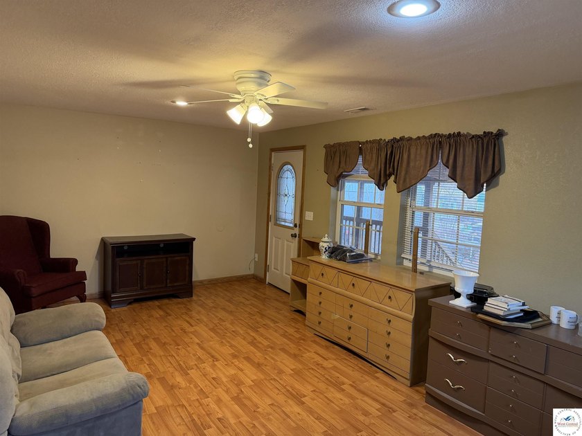 Enjoy the lake lifestyle in this spacious 4-bedroom, 2-bath home - photo 6
