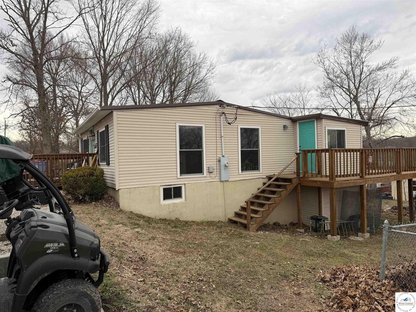 Welcome to this charming 4-bedroom, 1-bath second-tier home near - photo 3