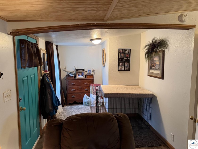 Welcome to this charming 4-bedroom, 1-bath second-tier home near - photo 10