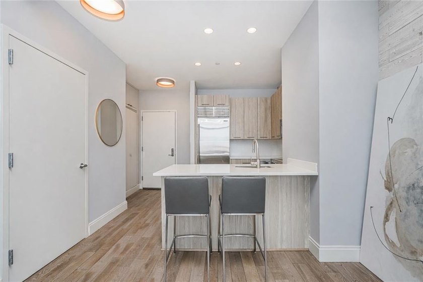 Unit 21B is a one-bedroom, one-bathroom unit. The property - photo 11