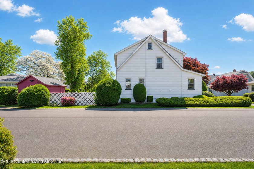 Welcome to 273 Waters Ave, a charming colonial set on a corner - photo 4