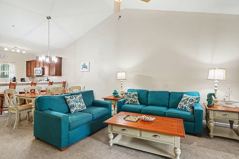 Welcome to this beautifully furnished third-floor condo located - photo 2